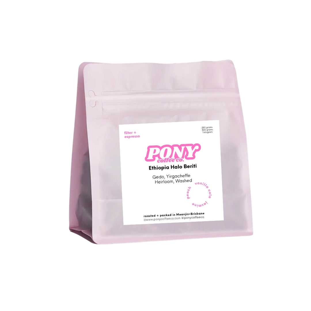 Pink coffee bag with a label on a white background