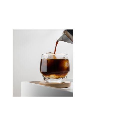 Pouring iced chilled black coffee