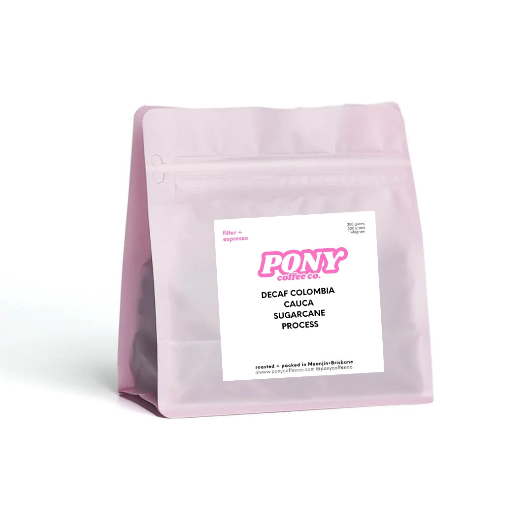 Pink coffee bag with a label on a white background