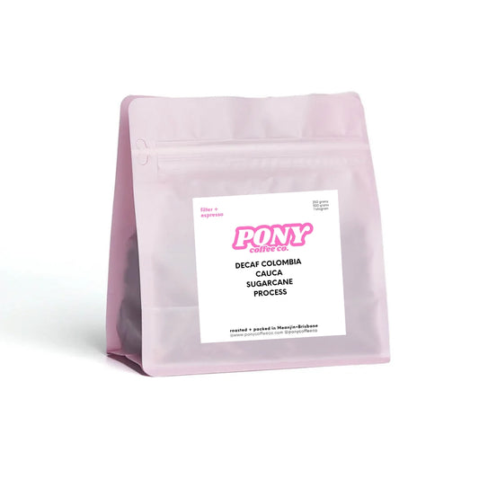 Pink coffee bag with a label on a white background