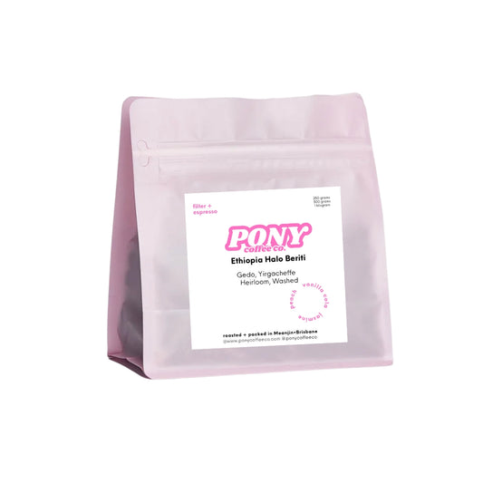 Pink coffee bag with a label on a white background