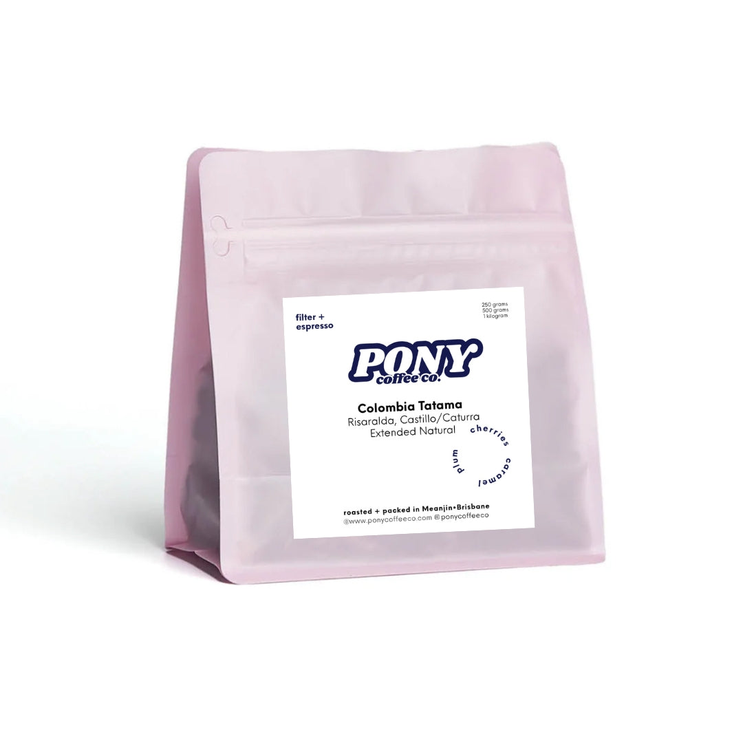 Pink coffee bag with Pony Coffee Co. label on a white background